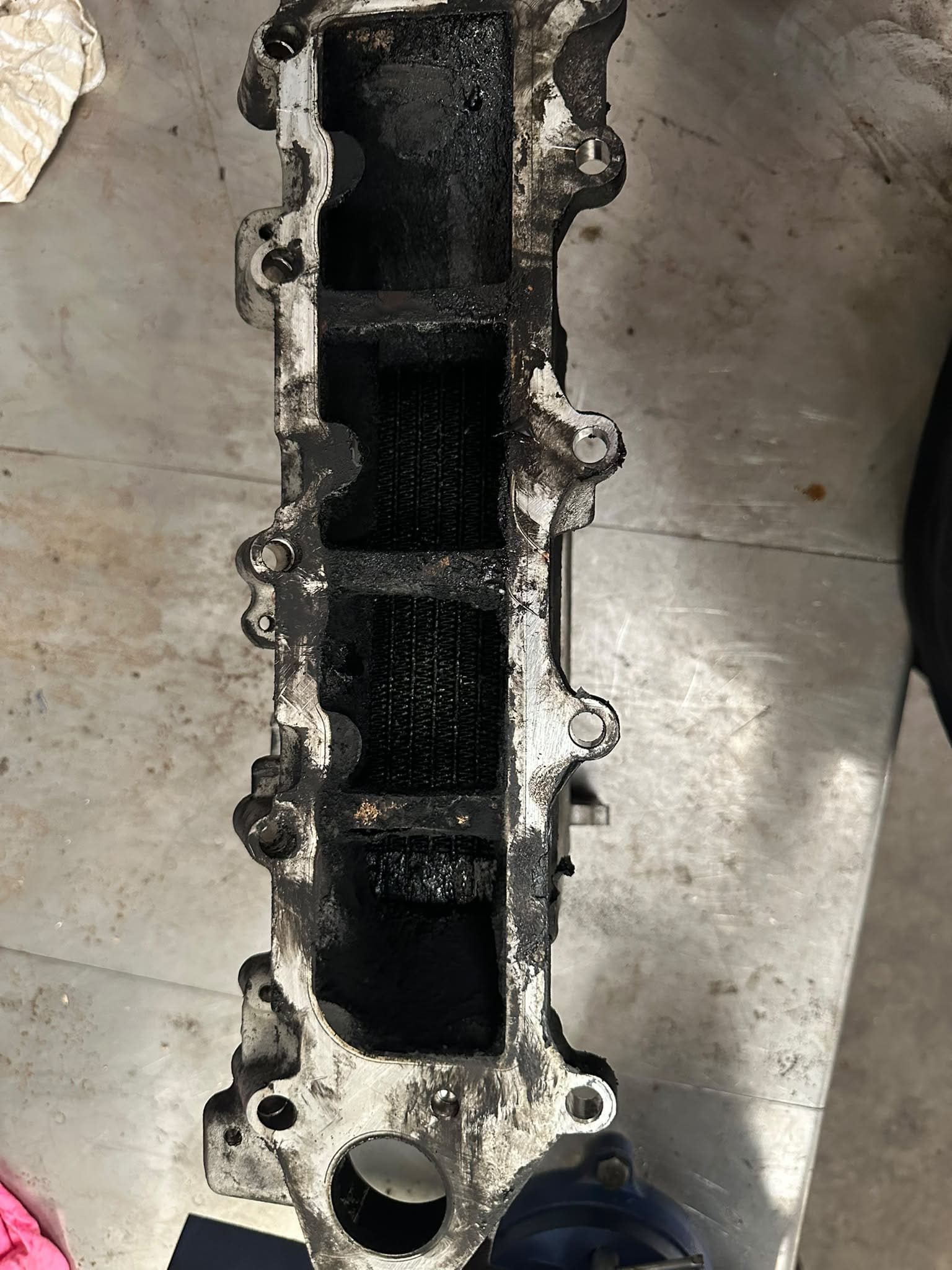 Heavy carbon contamination inside VW Audi low-pressure EGR cooler causing restricted airflow