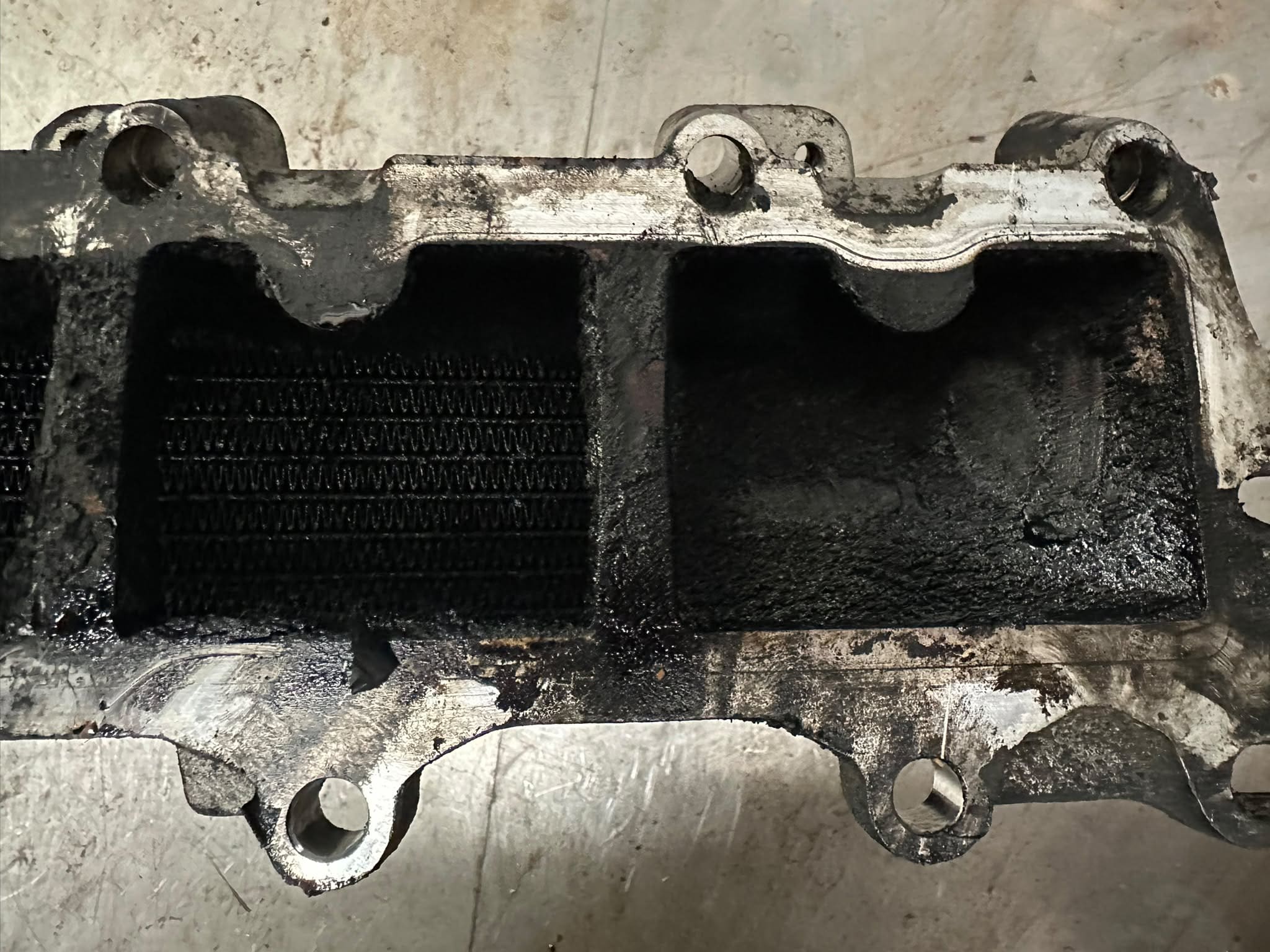 Carbon build-up inside VW Audi low-pressure EGR cooler causing fault code P200200